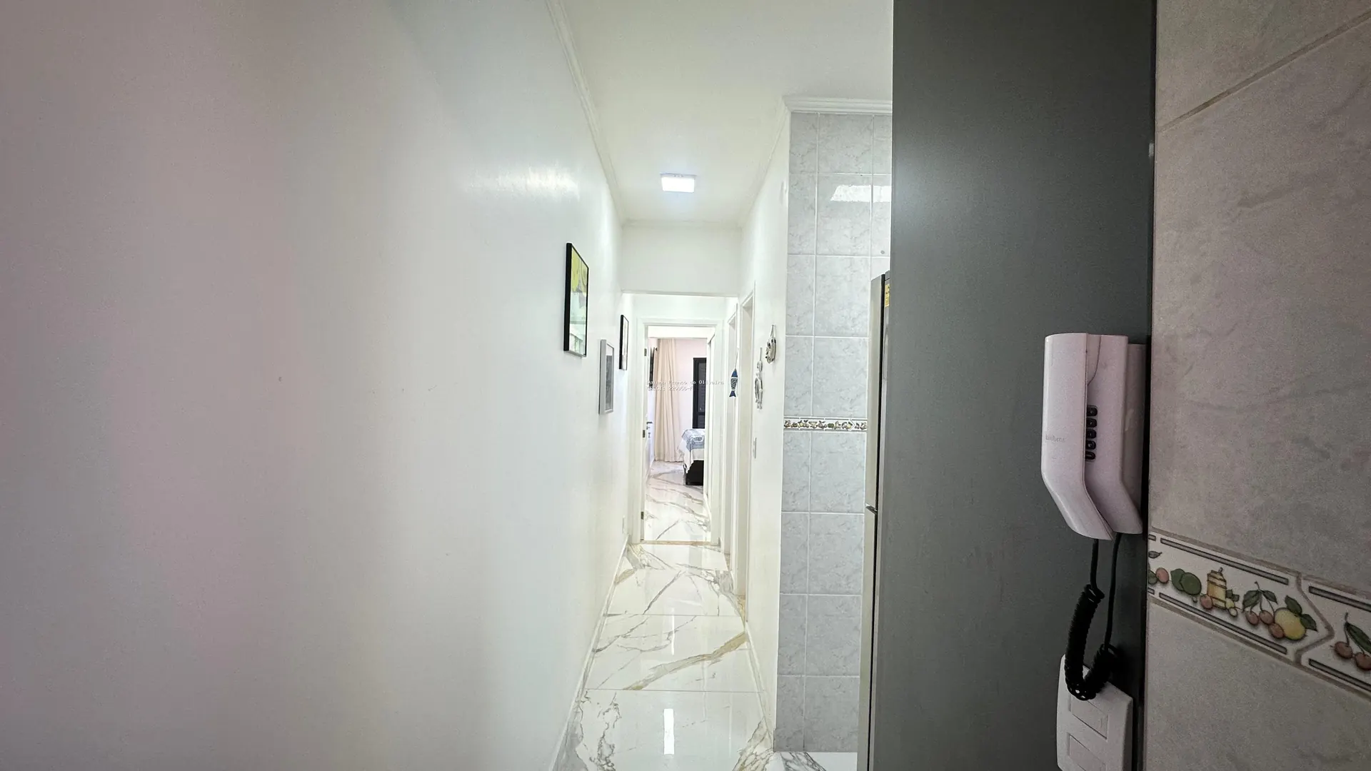 Apartamento à venda em Maracanã Praia Grande | Daiana Franco Imóveis - Maracanã em Praia Grande - foto 13 - 4 ACESSO COZINHA